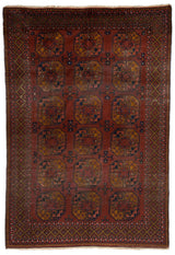 Alfombra oriental antigua con patrón geométrico rojo y azul.