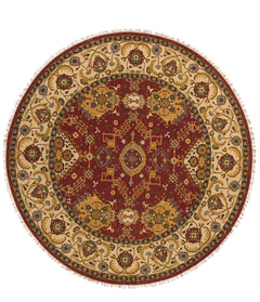 Vista completa de una alfombra oriental antigua, con un diseño octogonal y motivos geométricos elaborados en tonos suaves de beige, azul y marrón