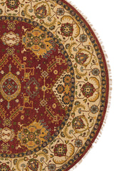 Detalle del borde de la alfombra con patrones de estrellas geométricas y adornos florales, realzado con colores pastel y bordes ornamentales.