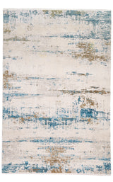 Vista completa de alfombra contemporánea en tonos marfil, azul y beige con patrón abstracto de efecto desgastado.