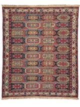 Vista completa de una alfombra oriental Kazak con múltiples medallones octogonales alineados en filas horizontales, en tonos rojos, azules, beige y verdes.