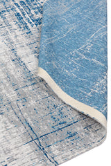 Imagen del reverso de la alfombra, mostrando su calidad y flexibilidad, ideal para cualquier espacio moderno.