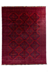 Vista completa de alfombra roja estilo Kazak con patrones geométricos y bordes ornamentados.