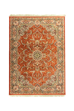 Alfombra clásica oriental en tonos anaranjado oscuro, blanco suave y negro con medallón central y diseño floral ornamental