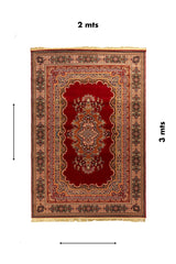 Alfombra clásica oriental roja con medallón central y diseño floral simétrico, presentada con medidas de 2 x 3 metros.