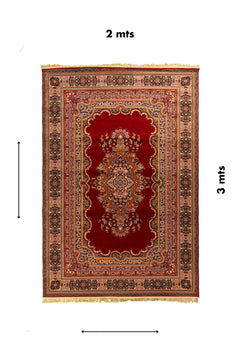 Alfombra clásica oriental roja con medallón central y diseño floral simétrico, presentada con medidas de 2 x 3 metros.
