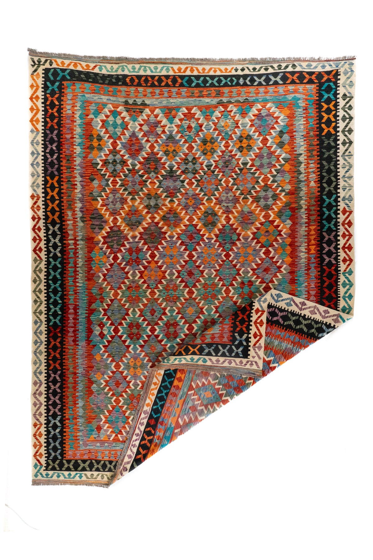 Alfombra Kilim multicolor con esquina doblada y diseño geométrico tipo tribal