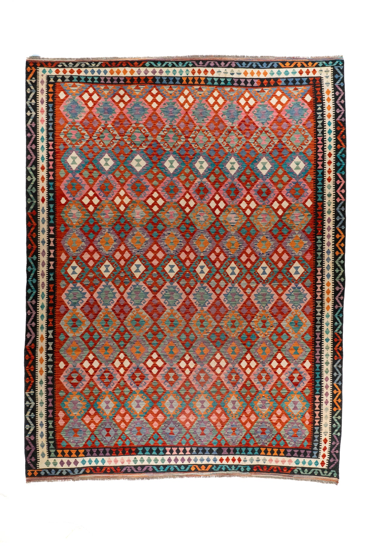 Alfombra Kilim rectangular multicolor con diseño geométrico en tonos rosa, celeste y violeta