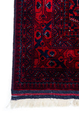 Detalle de guarda de Alfombra Persa Afgan en tonos rojo, negro y azul oscuro