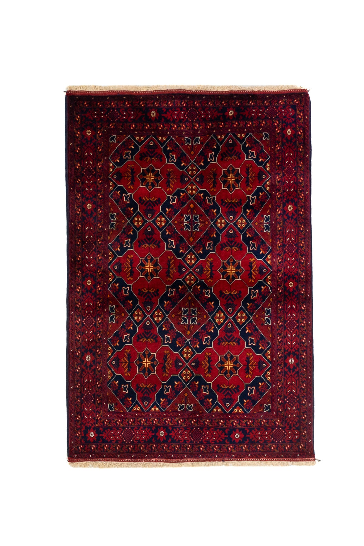 Alfombra de estilo geométrico con fondo rojo profundo, figuras simétricas en azul oscuro y detalles en tonos beige y rojo oscuro