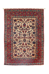 Alfombra Persa Ispahan Antik rectangular roja y beige con diseño floral clásico.