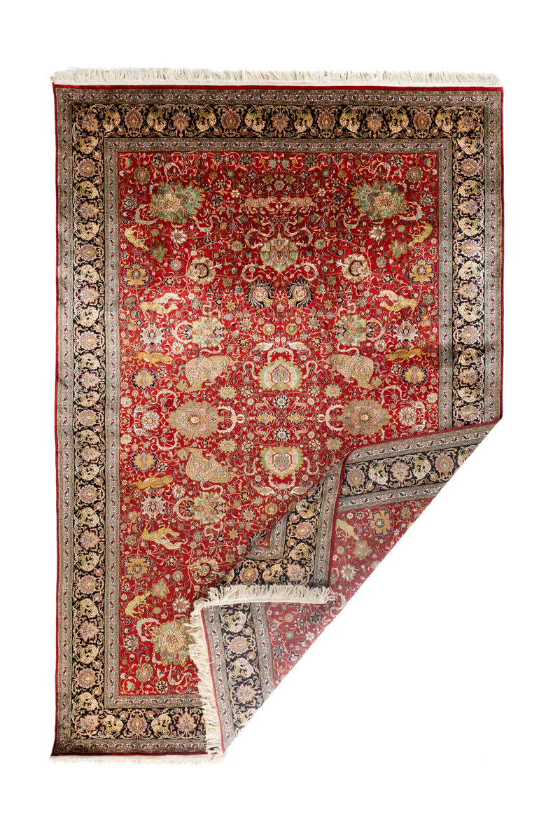 Alfombra Persa Ispahan Seda roja con esquina doblada, flecos y diseño floral ornamental
