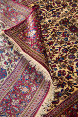 Detalle de guarda, flecos y textura de alfombra Persa Ispahan Seda Antik
