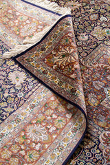 Detalle de textura, reverso y guarda floral de alfombra Persa Ispahan Seda rectangular