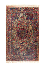 Alfombra persa Kirman Antik rectangular en tonos rojo y azul con diseño floral vintage