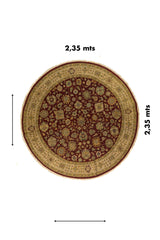 Alfombra redonda clásica de 2,35 metros en tonos rojo y beige con diseño floral tradicional.