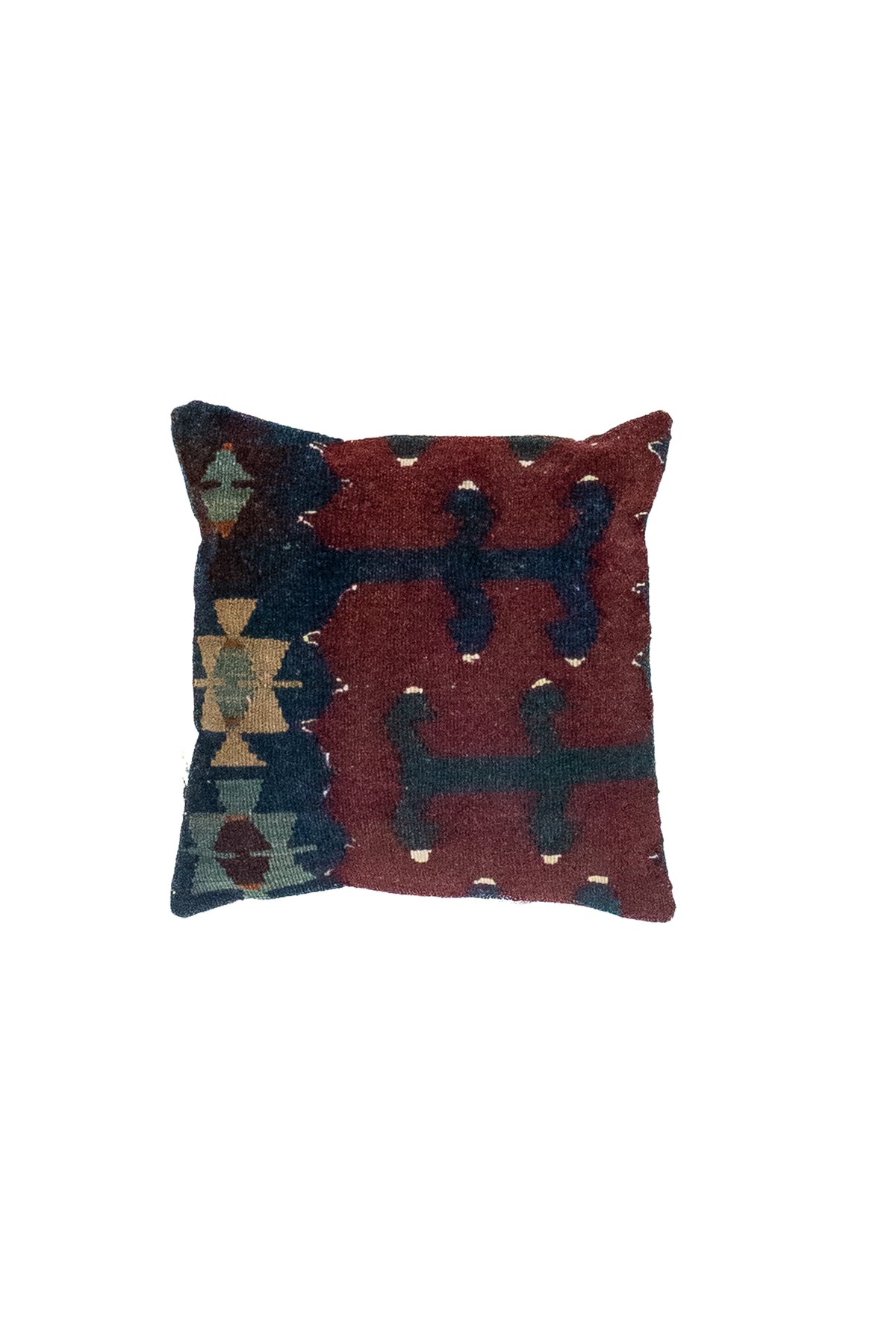 Almohadón persa kilim con diseño geométrico en azul oscuro y bordó
