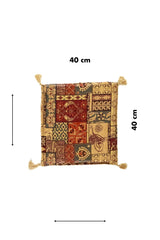 Almohadón patchwork de 40 x 40 cm con diseño multicolor y borlas decorativas