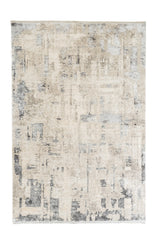 Vista completa de alfombra contemporánea en tonos beige, gris y azul con diseño abstracto.