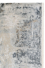 Detalle del tejido en tonos beige y gris, con patrón irregular y acabado texturizado.