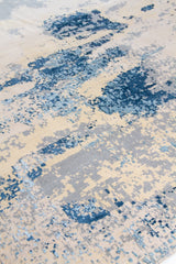 Detalle de textura de alfombra abstracta beige con manchas azules y grises