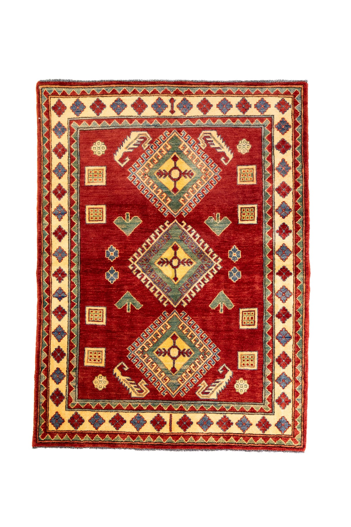 Alfombra Caucasica Kazak rojo y beige de 1.17 x 1.58 mts, vista completa vertical; el diseño muestra tres grandes medallones geométricos sobre un campo rojo y guardas claras con pequeños acentos