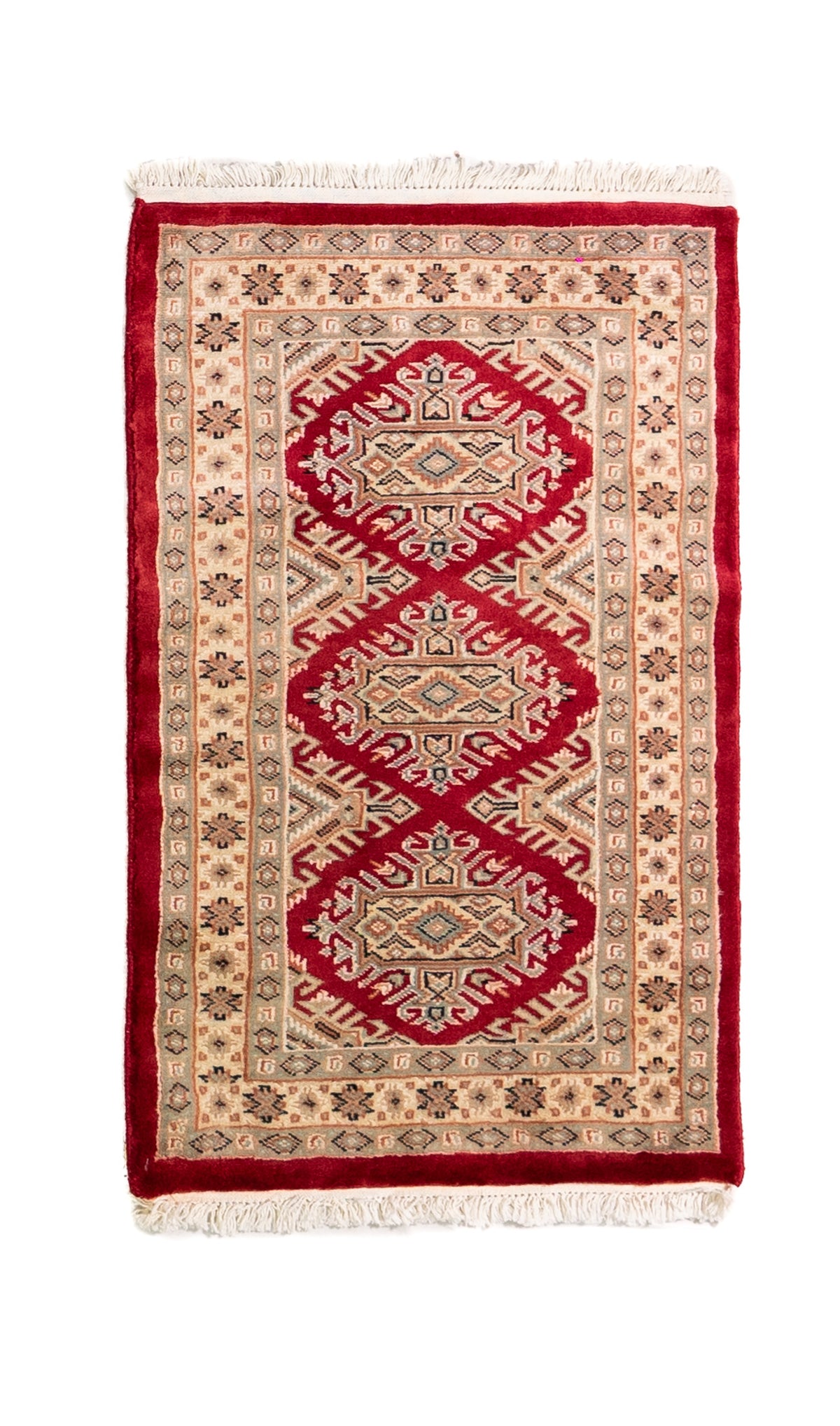Alfombra Persa Yamouth beige y rojo de 0.61 x 1.09 mts, vista completa vertical; el diseño muestra un motivo enlazado rojo de gran escala sobre un campo beige y un borde rojo intenso