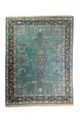 Alfombra Persa Nain verde y celeste de 2.35 x 3.00 mts, vista completa vertical con diseño floral; se observan motivos florales y vegetales continuos con guarda ornamental