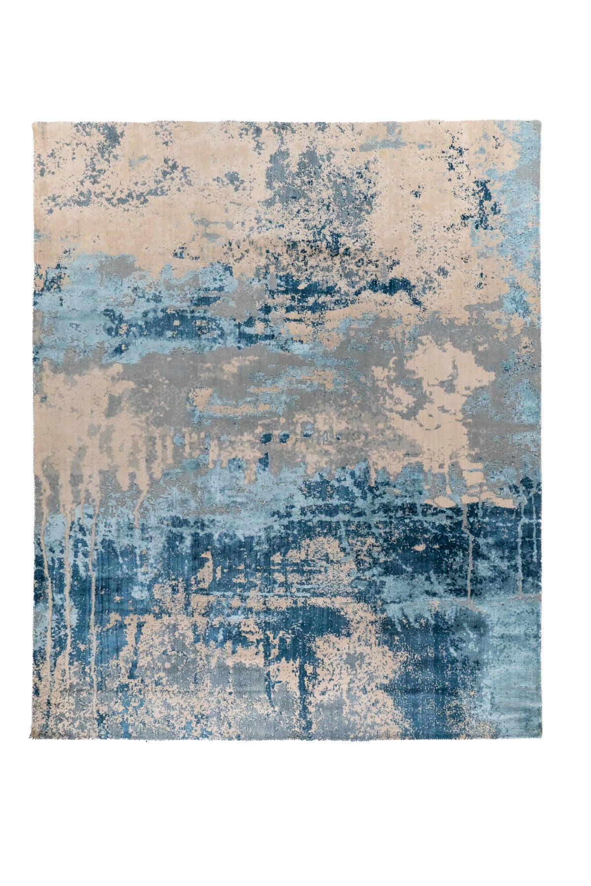 Alfombra Horizon Blue rectangular azul con diseño abstracto en tonos celeste y beige