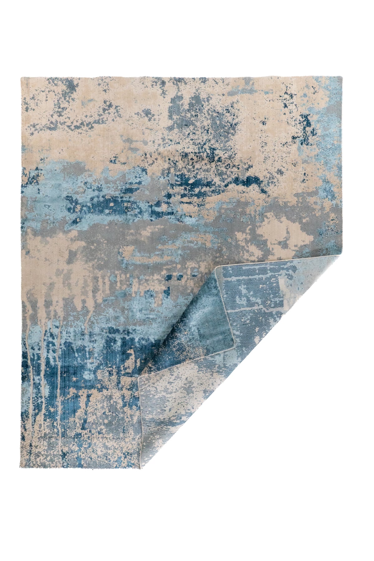 Alfombra Horizon Blue azul con esquina doblada y diseño abstracto moderno