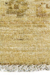 Alfombra Persa Isfahan beige de 1.83 x 2.68 mts, detalle cercano de textura visual y flecos; se observan ornamentación floral clara y guardas delicadas