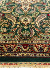 Alfombra Persa Horazan verde de 0.78 x 1.05 mts, detalle de guarda, trama visual y terminación de borde