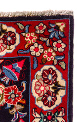 Alfombra Persa Horazan azul y rojo de 0.72 x 1.02 mts, detalle cercano de los motivos del campo y la combinación de tonos