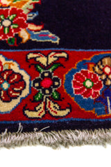 Alfombra Persa Sarouk azul y rojo de 0.69 x 1.05 mts, detalle de guarda, trama visual y terminación de borde