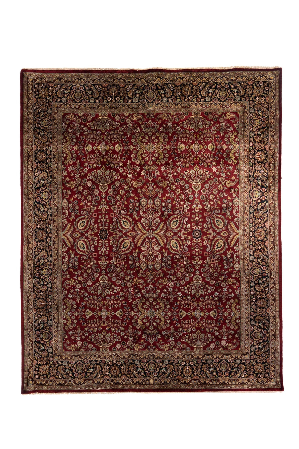 Alfombra clásica oriental en tono rojo profundo con diseño floral simétrico y guarda oscura decorada