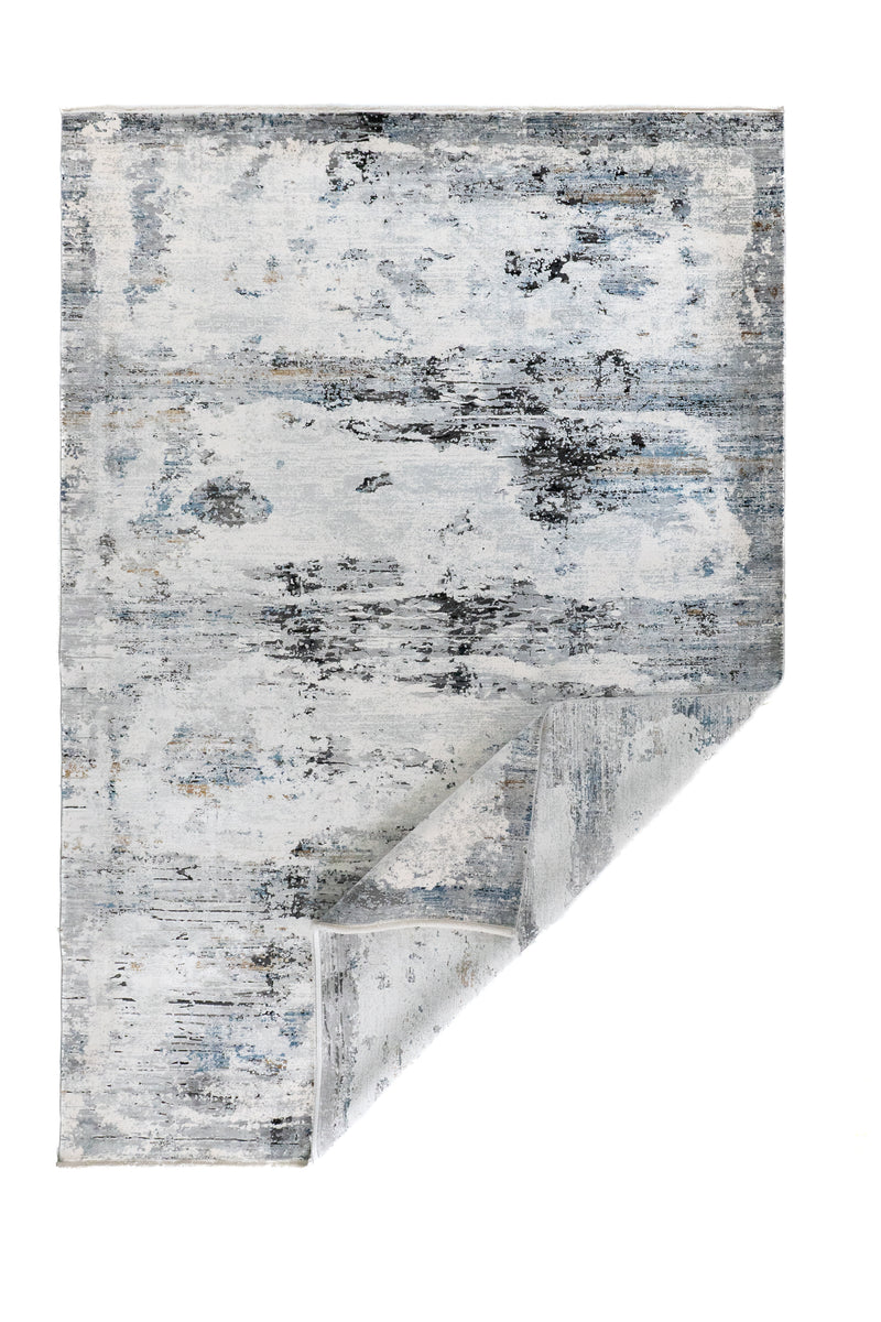 Alfombra Marble Grey rectangular con esquina doblada y diseño abstracto en tonos grises
