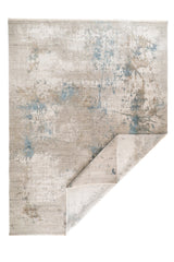 Alfombra decorativa rectangular Shadow con esquina doblada y diseño abstracto en tonos gris, celeste y acentos blanco