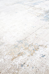 Detalle de textura de alfombra abstracta en tonos gris claro, blanco y celeste