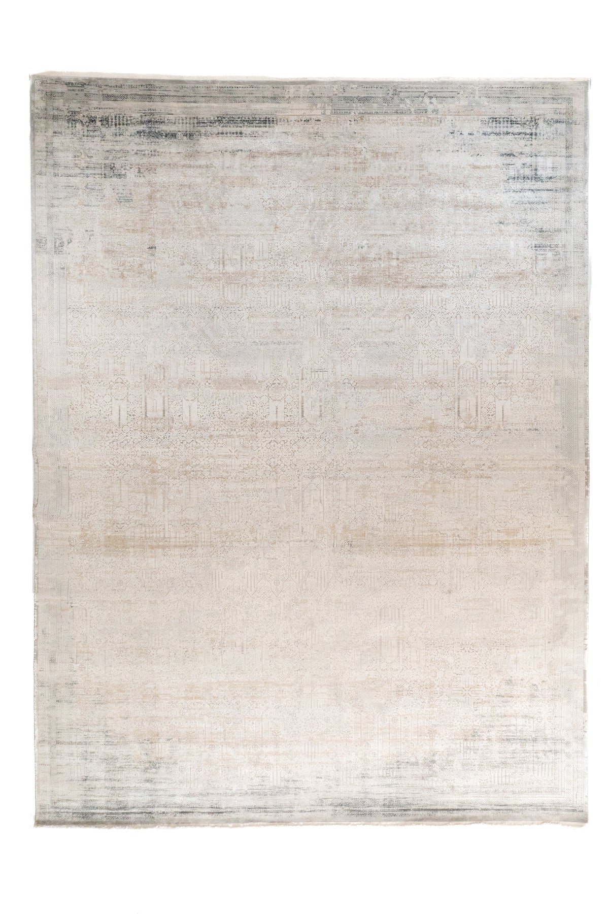 Alfombra Shadow rectangular en tonos beige y gris con diseño abstracto desgastado