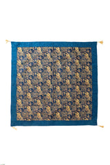 Textil Kaisery Azul cuadrado con diseño geométrico en tonos azules y dorados