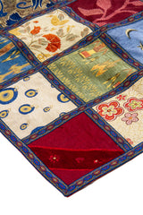 Detalle de textura y cuadros florales en textil Patchwork Tela Tapicería multicolor