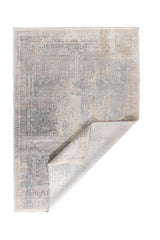 Alfombra Vintage Wash rectangular con esquina doblada y estilo vintage en tonos neutros