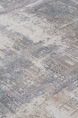 Detalle de textura de alfombra Vintage Wash con diseño geométrico desgastado en tonos grises