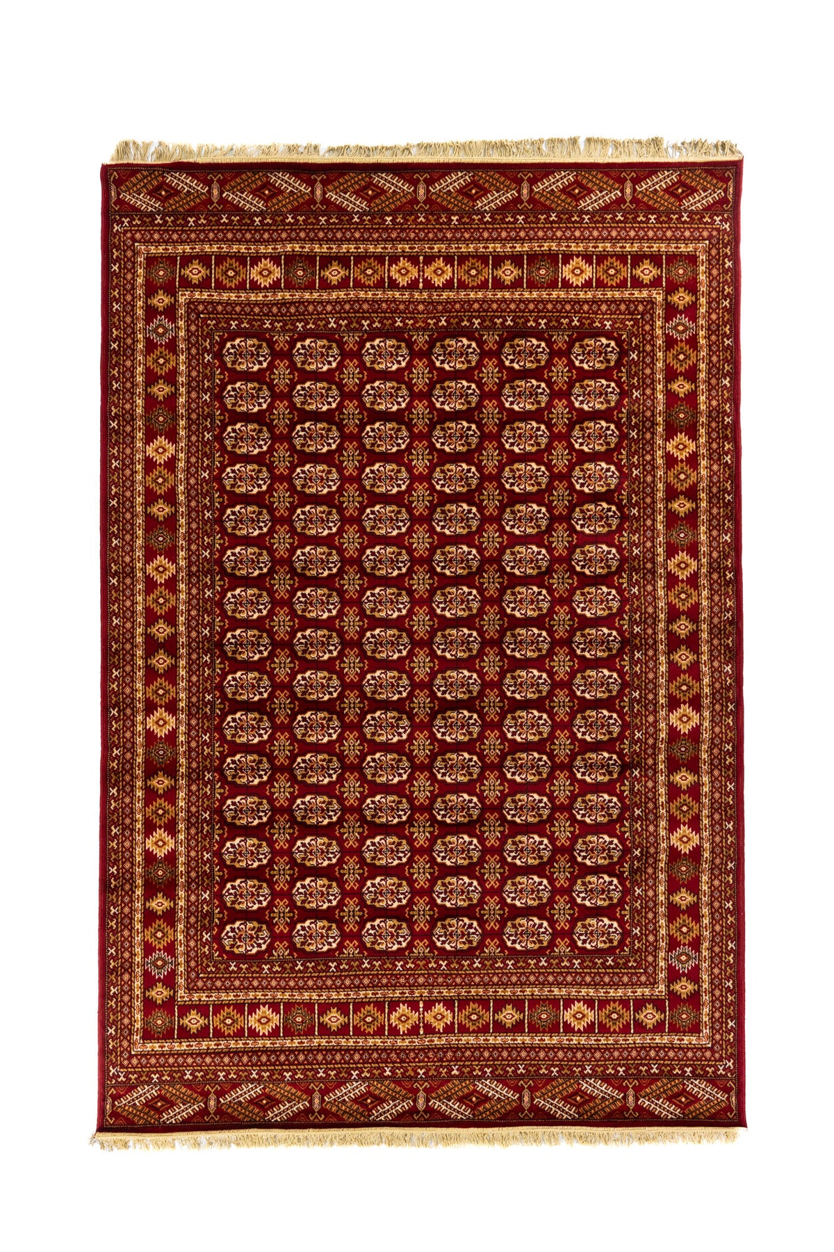 Alfombra clásica oriental en tonos rojo intenso y beige con repetidos motivos geométricos y guarda decorativa tradicional.
