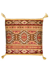 Almohadón rectangular de diseño turco con patrón geométrico en tonos tierra.