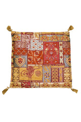  Almohadón decorativo rectangular con diseño geométrico turco en tonos rojos, beige y dorados.