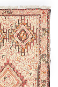 Alfombra persa antigua hecha a mano con patrón tradicional. Perfecta para añadir un toque étnico a cualquier espacio.